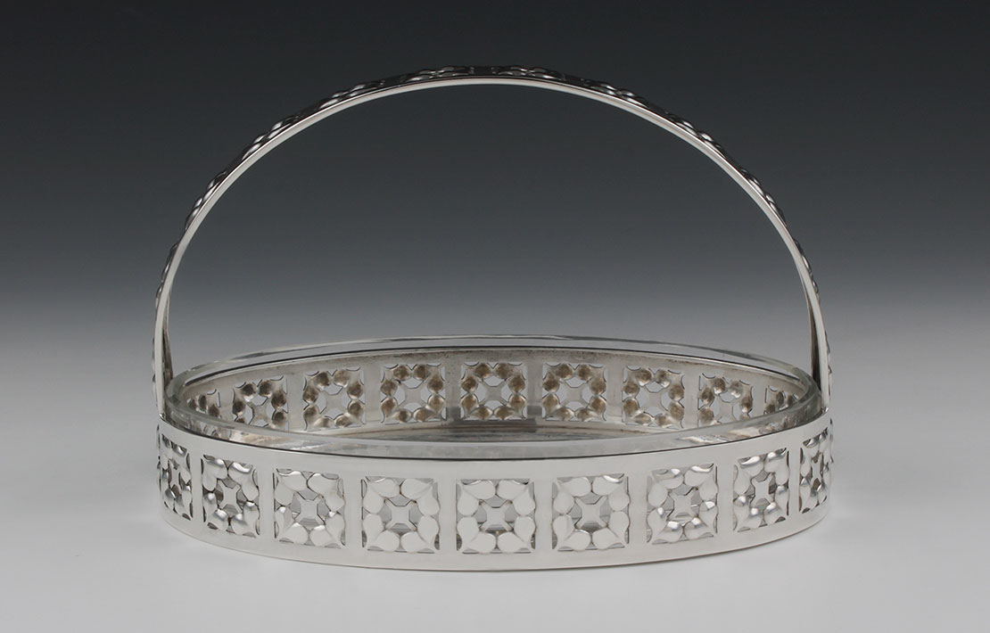 Josef HOFFMANN, (1870 - 1956), A museum quality 900 grade silver basket in “Cloverleaf” pattern designed for the Wiener Werkstätte, Vienna 1910